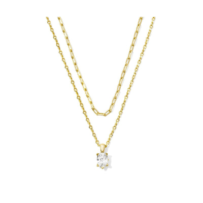 Gold necklace with a diamond pendant on a white background