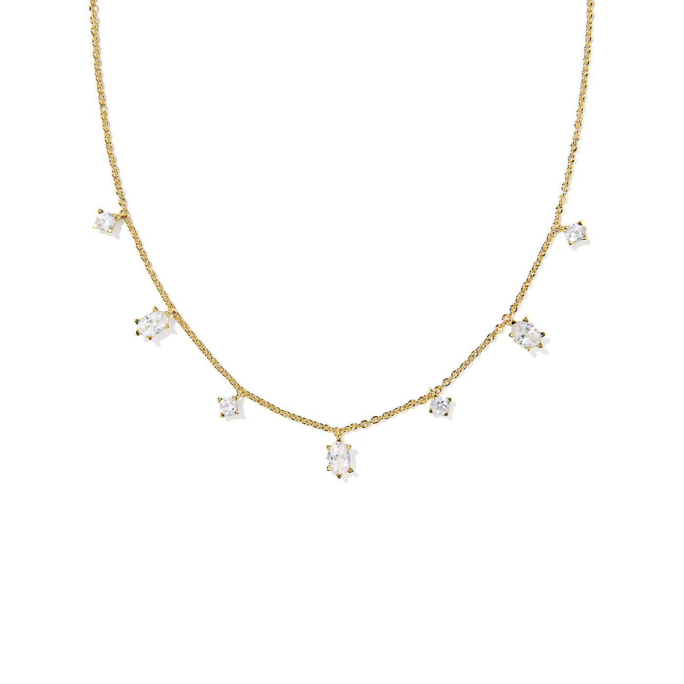 Gold necklace with small diamonds on a white background